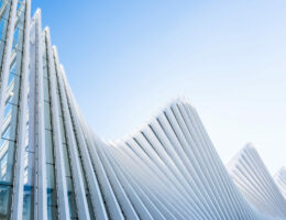 Abstract image of a curved shaped building, depcting volatility